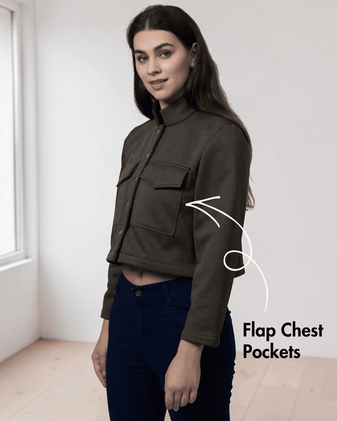 Back view of women's cropped jacket sewing pattern 'Noelle' with structured back design