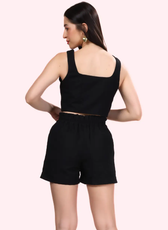 Side-back view of the 'Harper' coord set, showcasing the elasticated waistband and structured crop top. A stylish and comfortable sewing pattern.