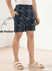 Side view of men's swim shorts 'Luca' sewing pattern showing back welt pocket and elastic waistband