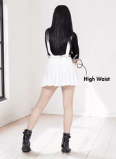 Back view of white pleated suspender skirt with high waist for women