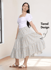 Close-up of floral tiered midi skirt sewing pattern with ruffled hem and elastic waist