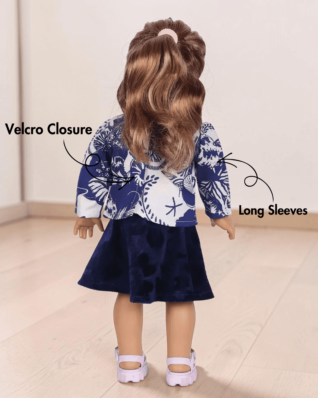 Doll sewing pattern with square neckline and long sleeves, back view