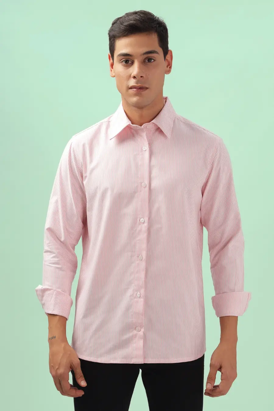 Model wearing a men's formal shirt made using the 'Patrick' sewing pattern. Features a structured collar, button-down front, and long sleeves.