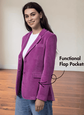 Close-up of women's pink blazer with single-breasted front and double welt pockets