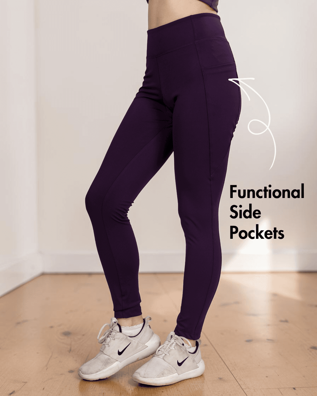 Back view of purple leggings highlighting supportive waistband and side pockets