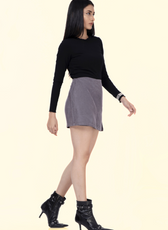 Walking pose in the 'Jasmine' skort, demonstrating its comfortable and stylish fit. A great sewing pattern for creating a fashionable mini skort.
