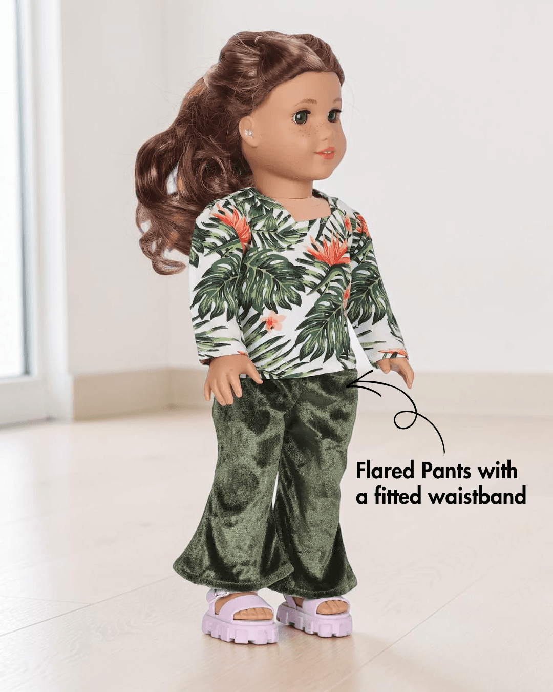 Doll with floral top and velvet flared pants sewing pattern side view