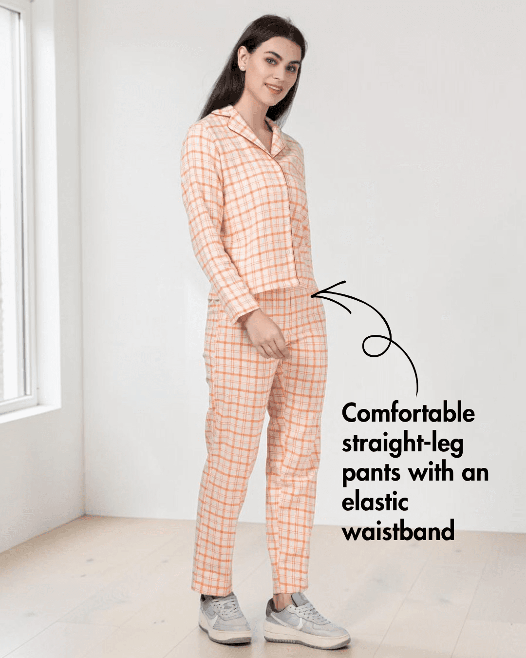 Side view of peach plaid pajama set with collar and straight-leg pants