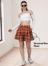Women's box pleat flared mini skirt PDF sewing pattern 'Ophelia' with pleated design and invisible side zipper, front view