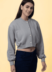 Close-up of the 'Raya' bomber jacket sewing pattern, highlighting the structured design, ribbed waistband, and snap button closure.