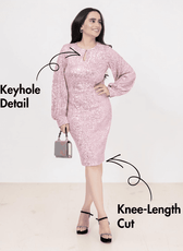 Model wearing pink sequin sheath dress with knee-length cut and keyhole detail