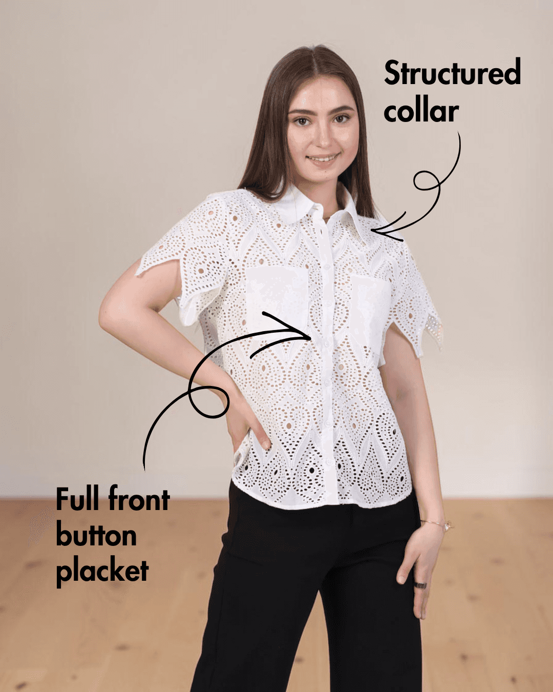 Front view of white eyelet short sleeve women's sewing pattern top with structured collar