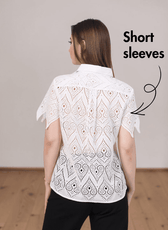 Back view of white eyelet short sleeve women's sewing pattern top with structured collar