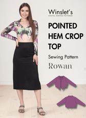 Model wearing pointed hem crop top with long sleeves and collar