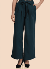 Close-up of wide-leg trousers with a self-tie belt and side pockets. Elegant pleated detailing enhances the structured silhouette.