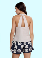 Back view of the braided halter top from the 'Tulip' sewing pattern. Displays the stylish keyhole detail and secure braided strap tie.