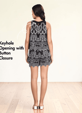 Back view of black and white embroidered summer coord set with scalloped hem and wide straps