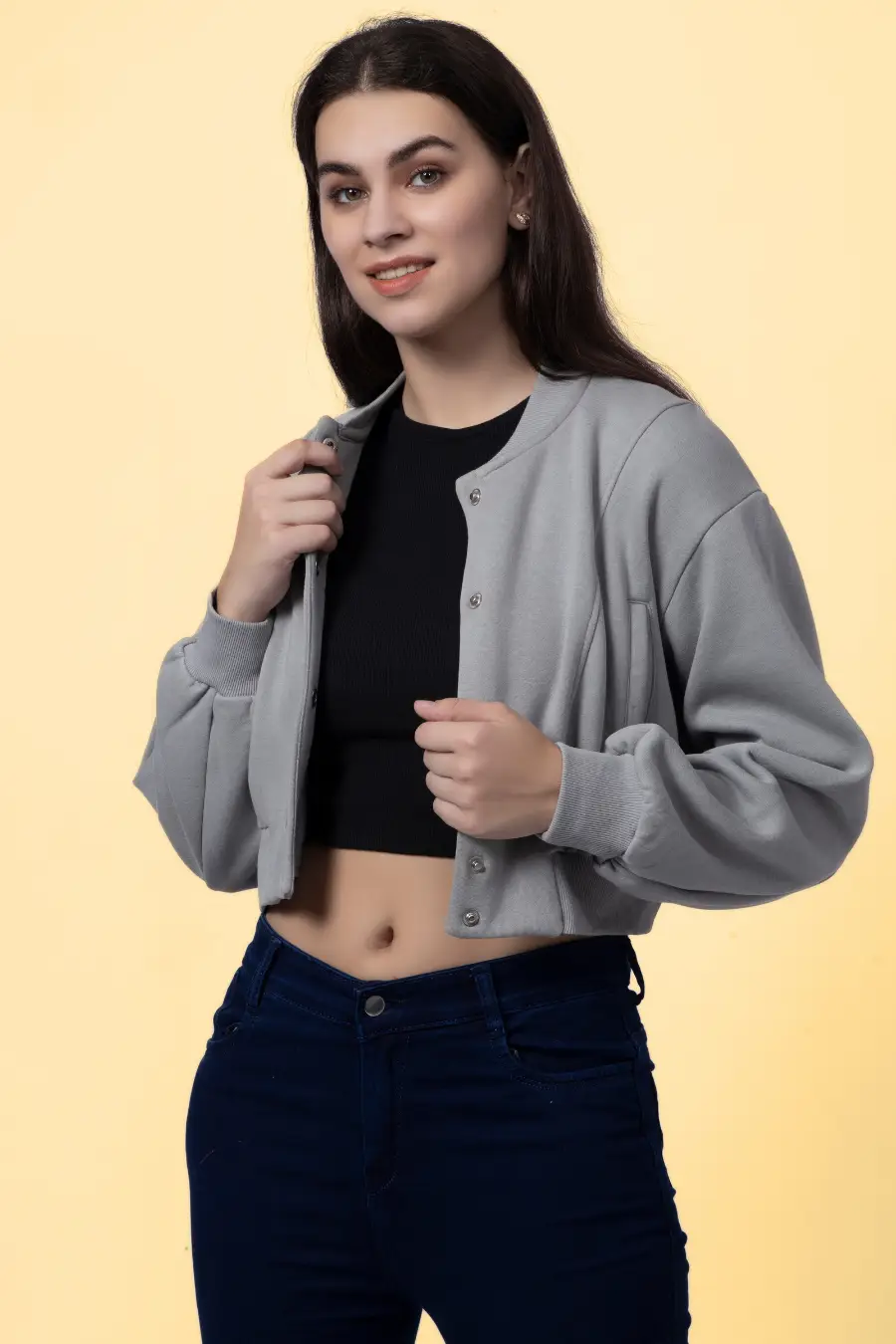 DIY bomber jacket made using the 'Raya' sewing pattern, featuring a cropped silhouette, ribbed collar, and front button closure.