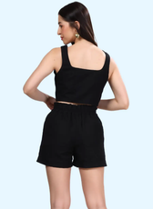 Back view of 'Harper' cropped waistcoat showing square neckline and fitted design. A sewing pattern for a modern, sleeveless waistcoat top.