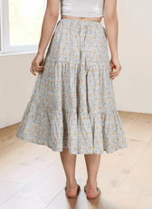 Front close up of tiered midi skirt sewing pattern with flattering design and versatile styling