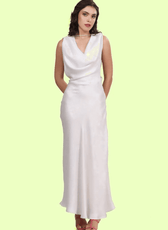 Front view of a model wearing backless cowl neck gown