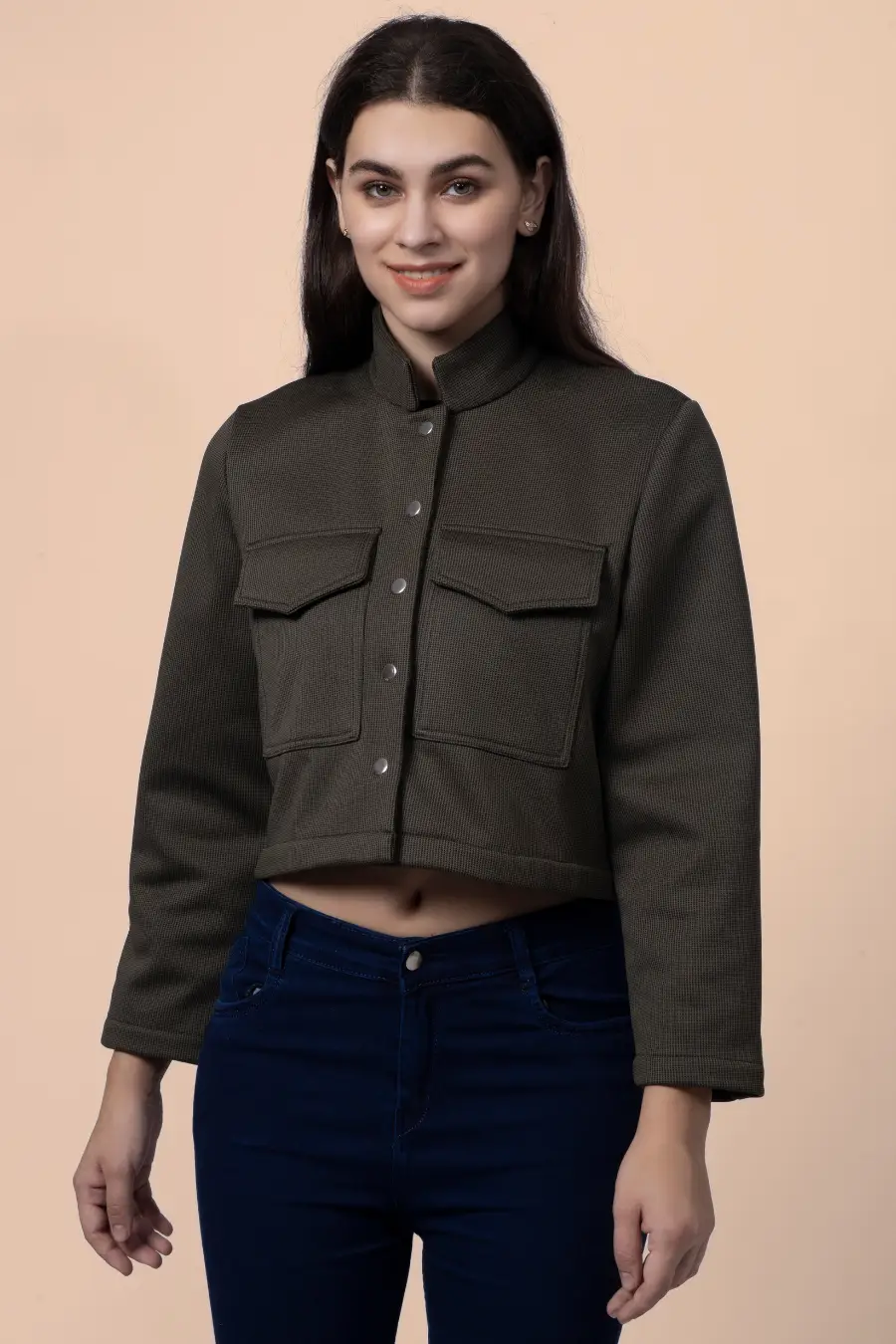 Front view of the 'Noelle' short jacket with a high collar, button closure, and flap chest pockets, designed for a structured and stylish fit.