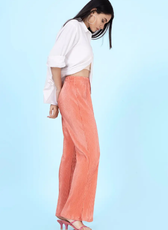 Side view of flared pants from the 'Brook' sewing pattern. Features a high-waisted fit and wide-leg design, perfect for a chic and comfortable look.