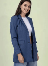 Side view of the 'Camille' straight-cut coat sewing pattern. The tailored design features structured shoulders, a notched lapel, and a single-breasted closure.