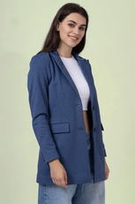 Side view of the 'Camille' straight-cut coat sewing pattern. The tailored design features structured shoulders, a notched lapel, and a single-breasted closure.