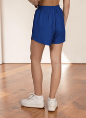 Back view Close-up of women's blue athletic shorts showing pattern details and fit