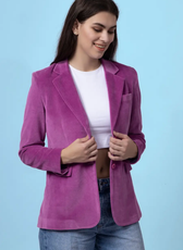 Model wearing the Monroe blazer, highlighting its sophisticated silhouette with a tailored fit and functional pockets. A beginner-friendly sewing pattern in multiple sizes.