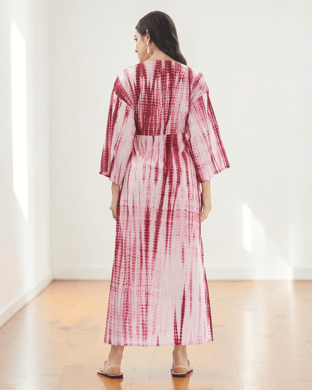 Back view of pink and red tie-dye kaftan maxi dress with adjustable drawstring waist