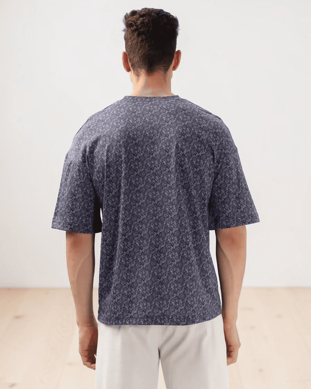 Back View of men's T-shirt sewing pattern details with crew neckline and drop shoulders
