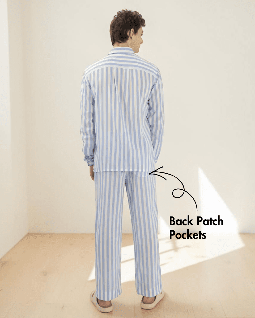 Men's striped pajama top with front button closure, back view