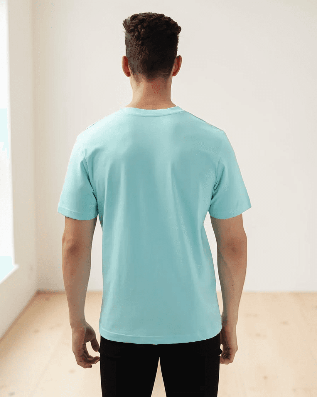 Back view of men's turquoise T-shirt sewing pattern  with straight hem and short sleeves