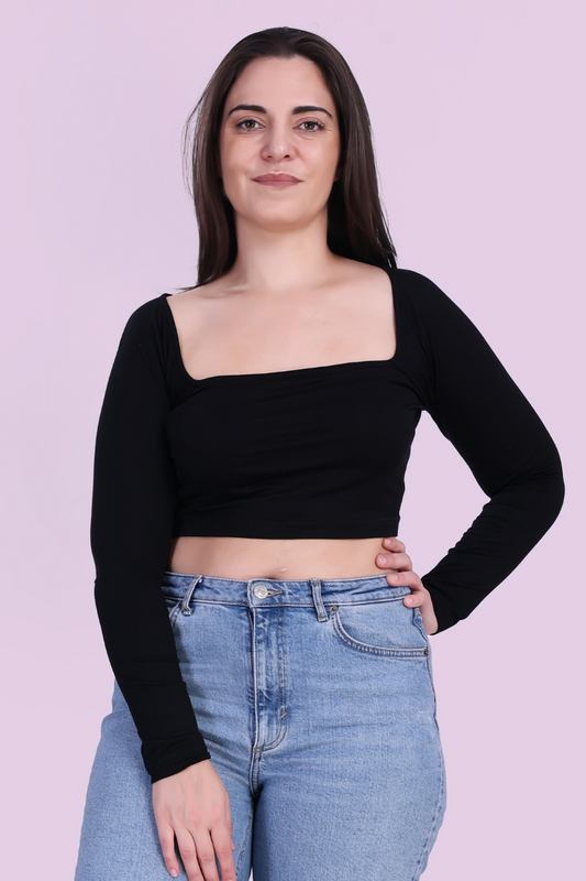 Image of model wearing a black square neck top sewed with winslet's patterns