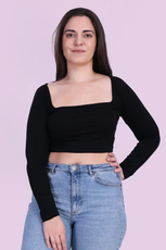 a woman wearing a black square neck bodycon crop top sewed with Winslets patterns and jeans 