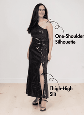 Model wearing black sequined one shoulder evening dress with thigh-high slit