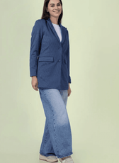 Casual styling of the 'Camille' straight-cut coat sewing pattern. The blue coat is paired with wide-leg jeans and sneakers for a relaxed yet polished look.