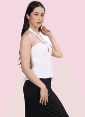 Side view of the 'Alice' halter top, highlighting the flared hem and elegant halter neckline. A must-have sewing pattern for DIY fashion lovers.