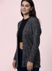 Side view of the 'Nora' long cardigan, highlighting its draped fit and long sleeves. A perfect layering piece for comfort and style.