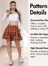 Model wearing plaid skirt with pattern details and high waist
