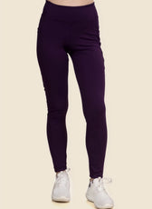 Front view of high-waisted running leggings made using the Layla sewing pattern. Features a snug fit and side pockets, ideal for workouts and casual wear.