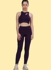Model wearing the 'Layla' activewear coord set, showcasing a cutout sports bra and high-waisted leggings. Perfect for workouts with a snug, supportive fit.