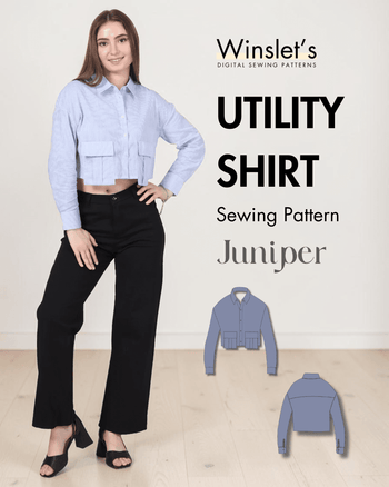 Women wearing cropped blue striped utility shirt with large pockets, long sleeves, point collar, button cuffs, and relaxed fit
