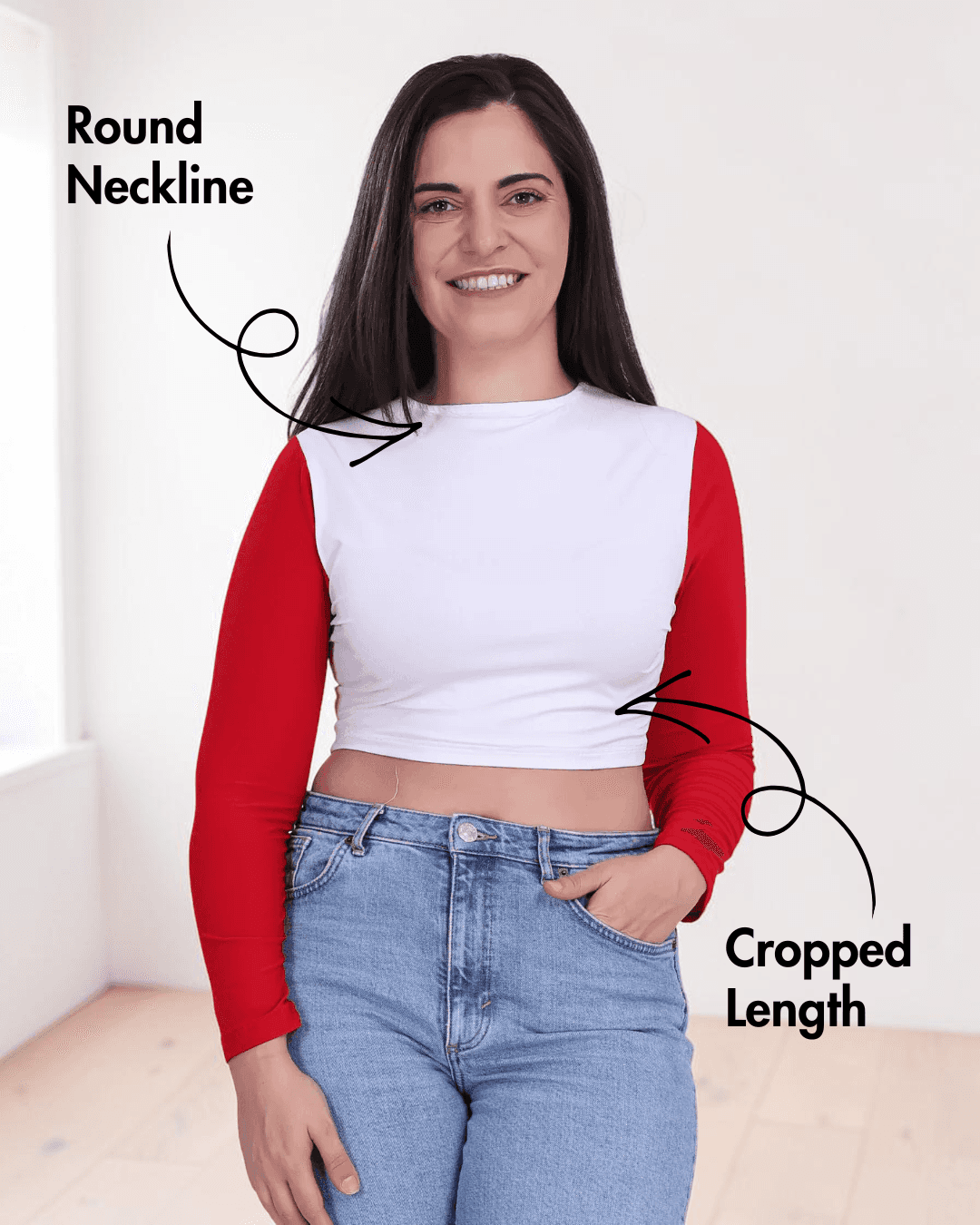 Woman wearing long sleeve crop top with round neckline and cropped length