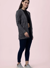 Angled side view of the 'Nora' long cardigan, displaying its relaxed silhouette and open-front design. Ideal for casual and loungewear outfits.