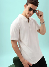 Stylish men's polo shirt from the 'John' sewing pattern. Model accessorizes with sunglasses, highlighting the shirt's versatile and modern design.