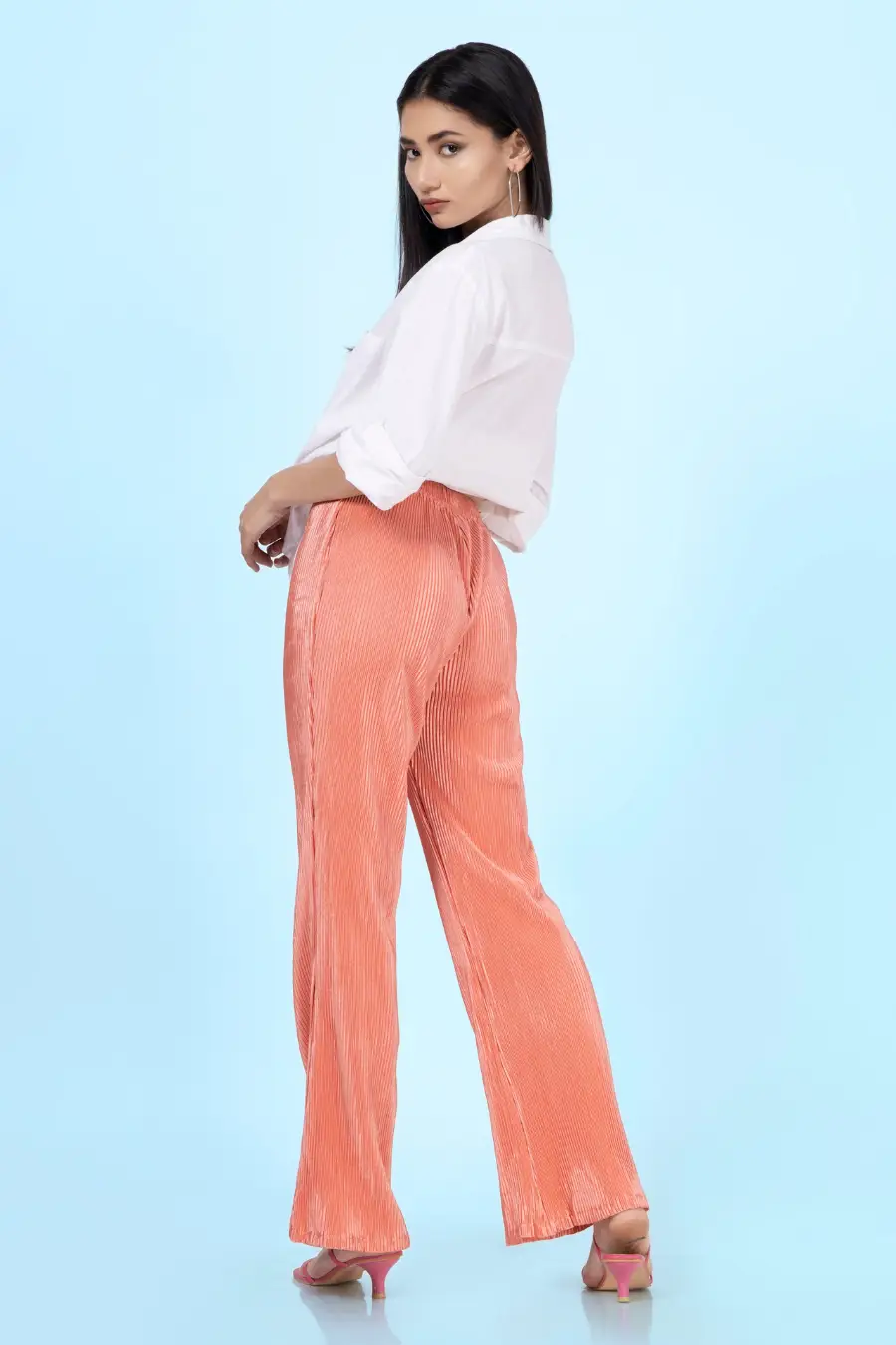 Rear angle of the 'Brook' flared pants sewing pattern. Designed with a high-waisted fit and stylish wide-leg silhouette for a sophisticated look.