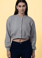 Front view of the 'Raya' bomber jacket sewing pattern, displaying its stylish cropped fit, ribbed details, and structured seams.